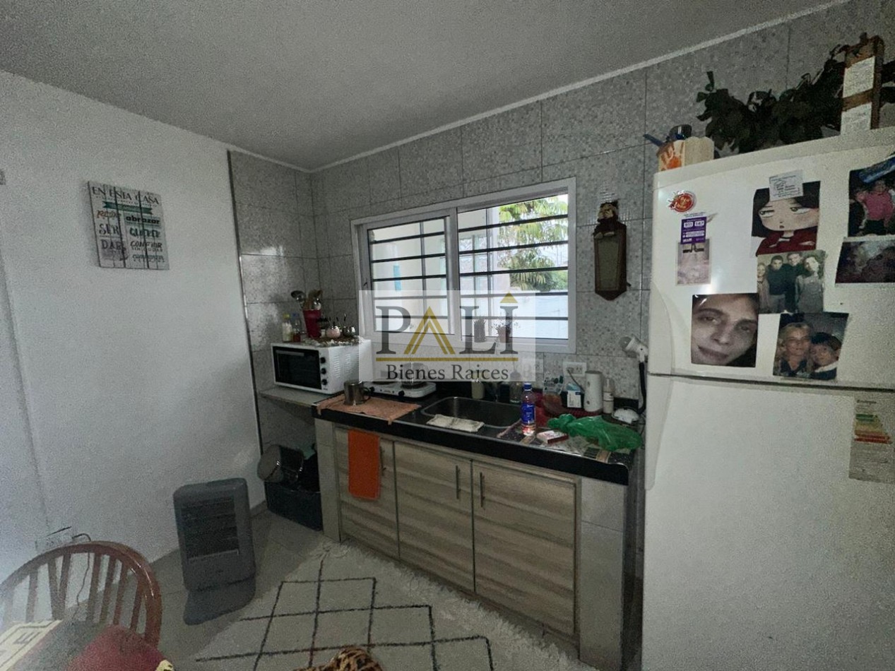 SE VENDE CASA DE 4 AMBIENTES Y DEPARTAMENTO DE 2 AMBIENTES 